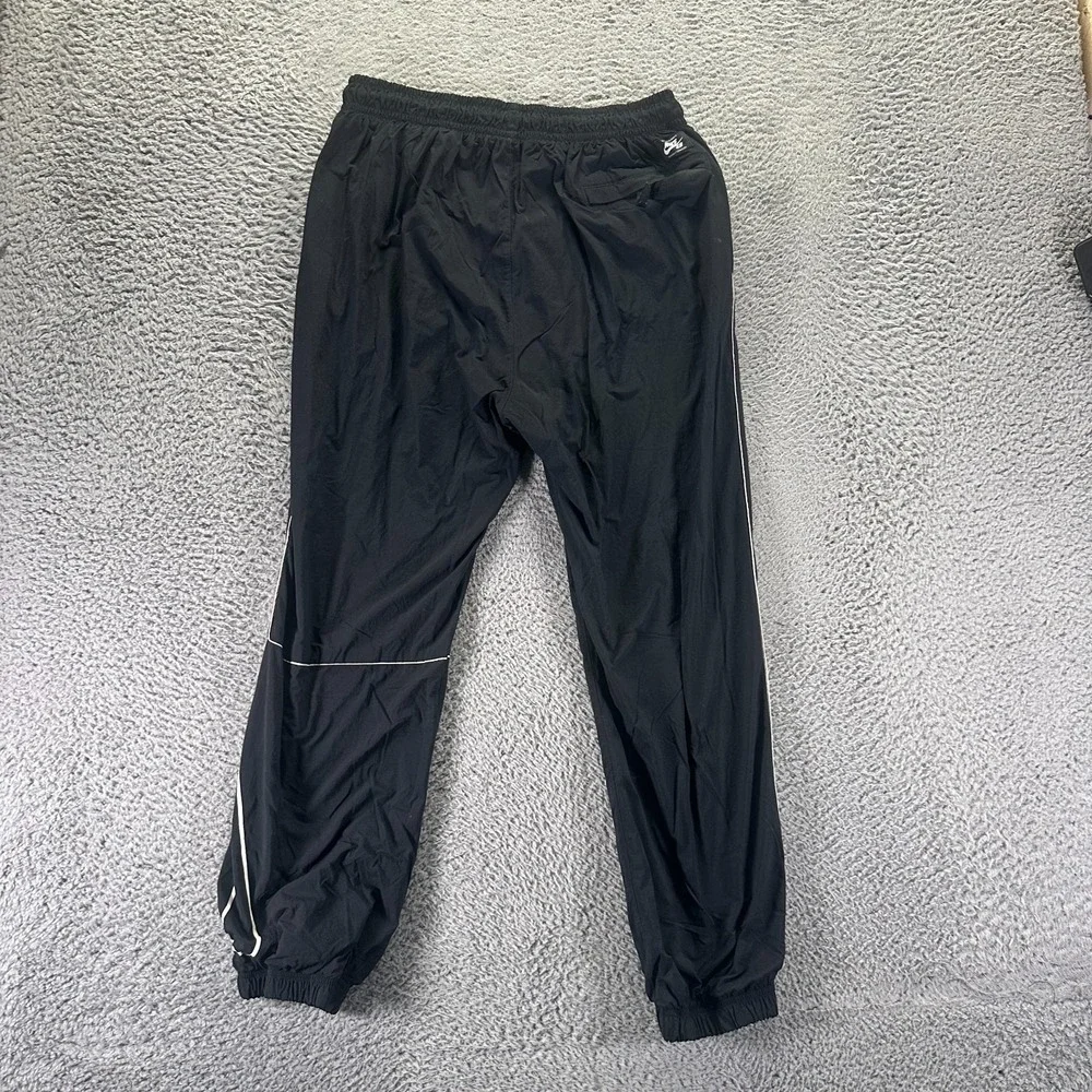 Nike SB Pant Mens S Black Nylon Jogger Tapered Mesh Lined Skateboarding Stretch